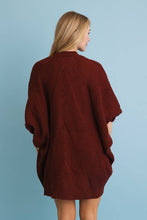 Load image into Gallery viewer, Model wearing oversized ribbed open front cardigan with front pockets
