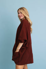 Load image into Gallery viewer, Model wearing oversized ribbed open front cardigan with front pockets
